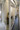 Corridor a wall of sliding doors in the manner of Japanese shoji screens